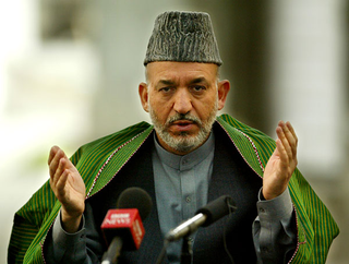 De facto president Hamid Karzai pledges to illegitimately rule the country with an iron fist by the will of the people.